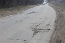 Большой Дачный проспект покрывается выбоинами