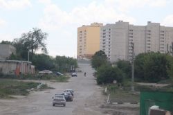 Улица Томская снова покрылась выбоинами